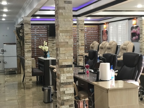 Maya nails & spa logo